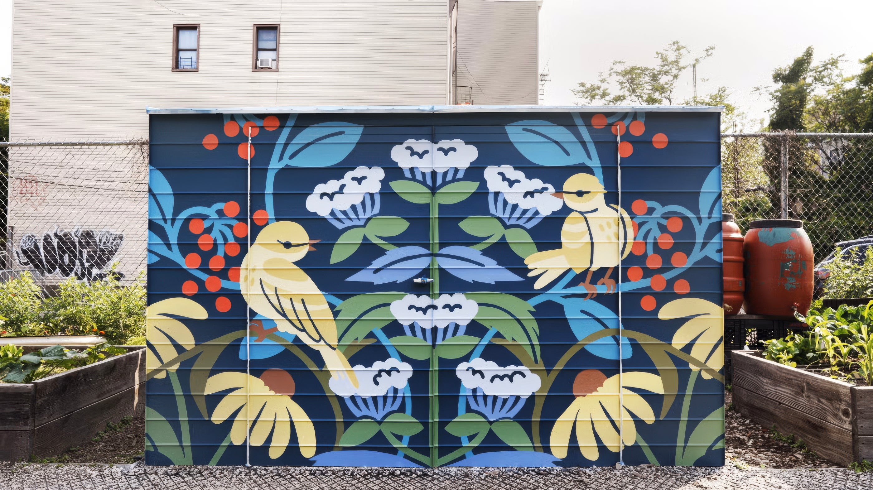 A garden shed painted with Blackpoll Warblers and native flowers.